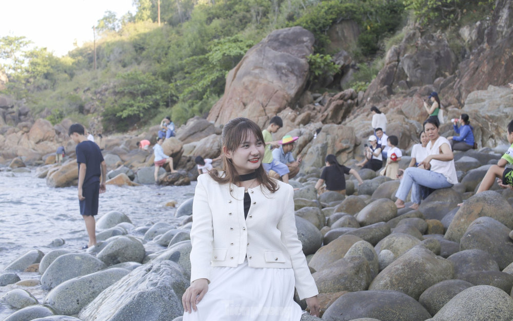People flock to Queen’s Beach to capture the unique egg-shaped stones